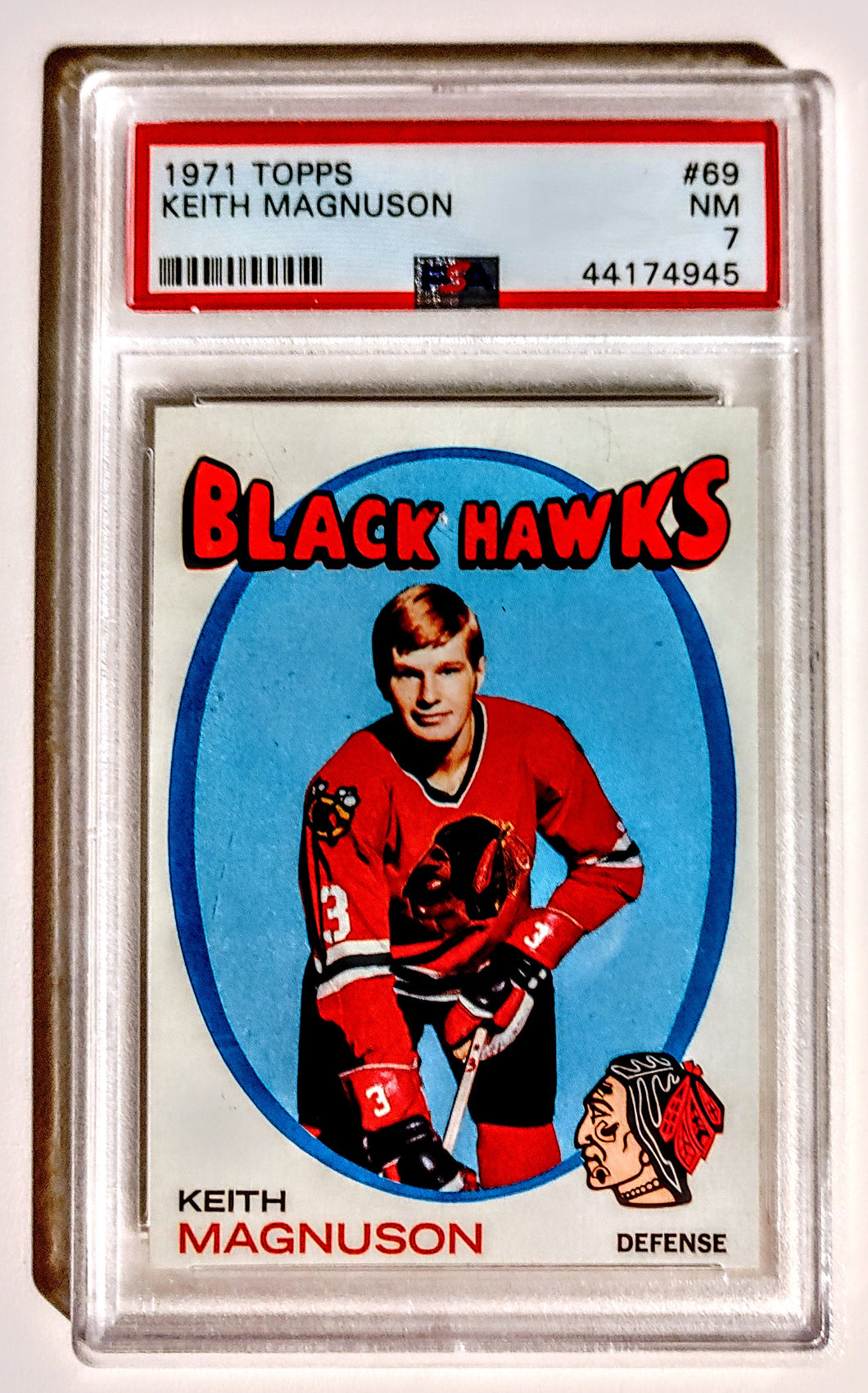 1971 Topps NHL Hockey Card; Keith Magnuson, Chicago Blackhawks, Card # 69; Near Mint (NM), Graded PSA 7
